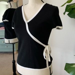 Black and white blouse with a tie